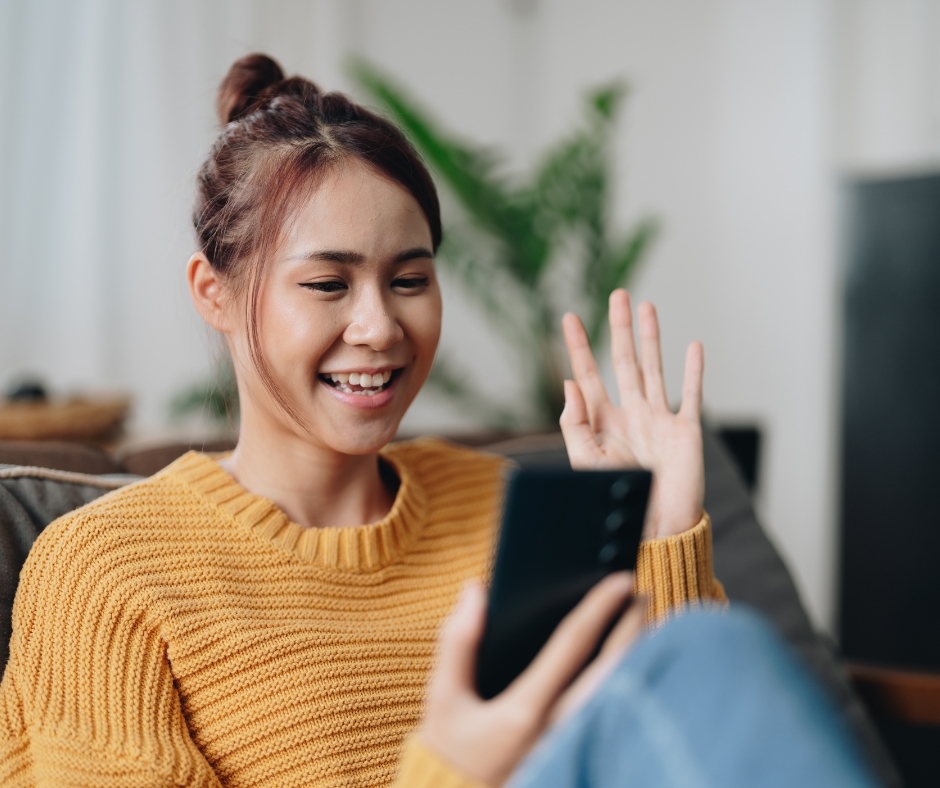 Woman introducing herself during an online therapy session over video call