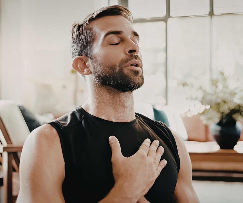 Man taking a deep breath during a calming mindfulness moment