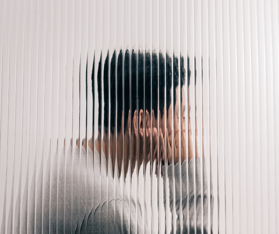 Man experiencing anxiety and stress while sitting alone