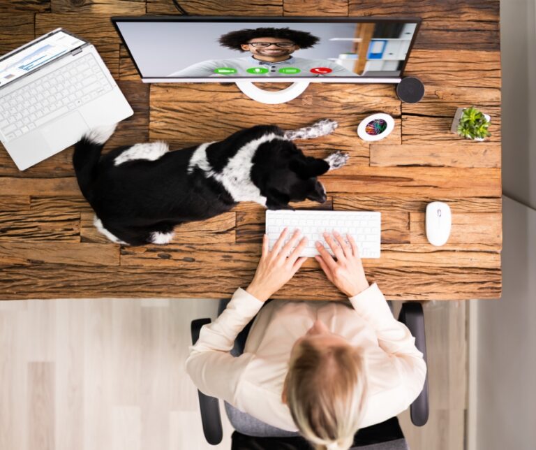 Woman participating in an online therapy session from home