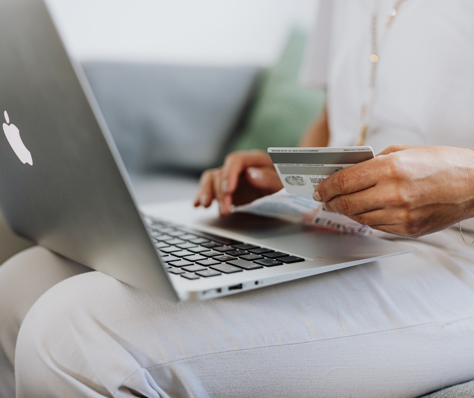 Alt Text:
Person reviewing insurance and payment information on a laptop